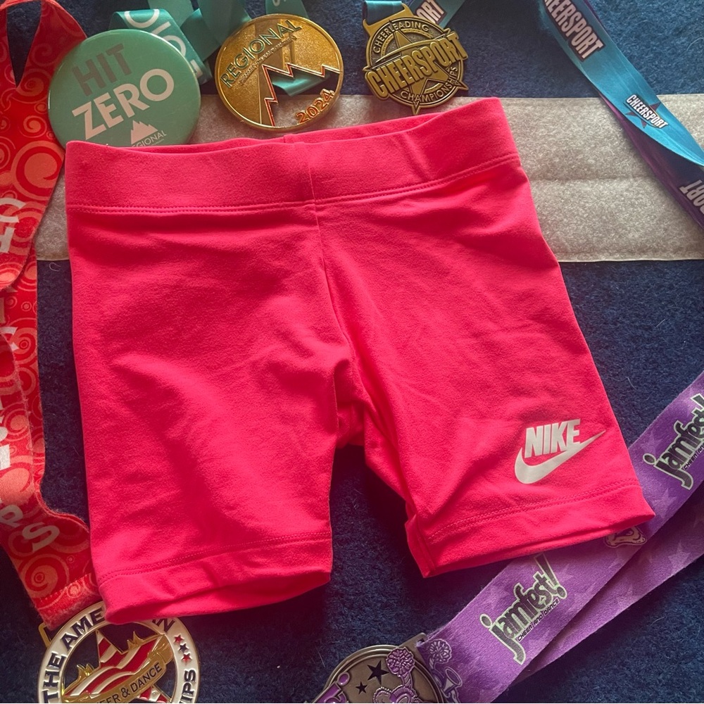 Hot pink Nike shorts